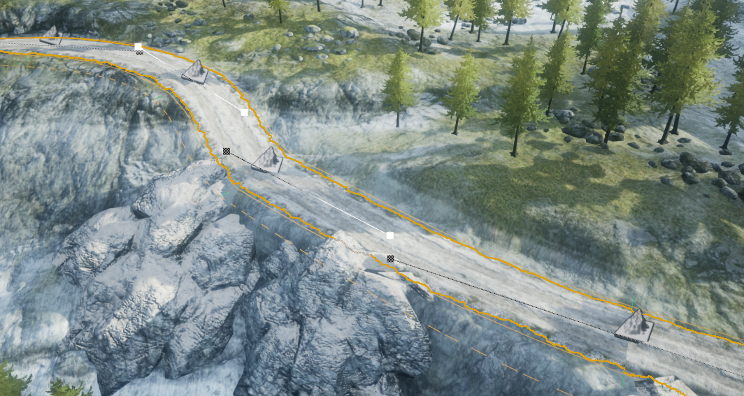 A road selected along a rocky hillside in the Unreal Editor.